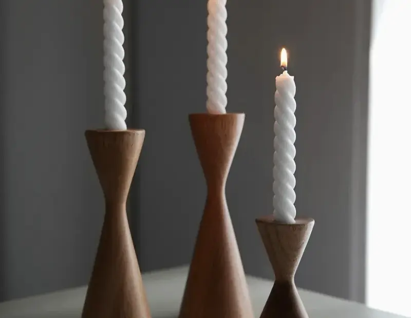 Wooden candlesticks with spiral candles - minimalist still life warmth 🕯️