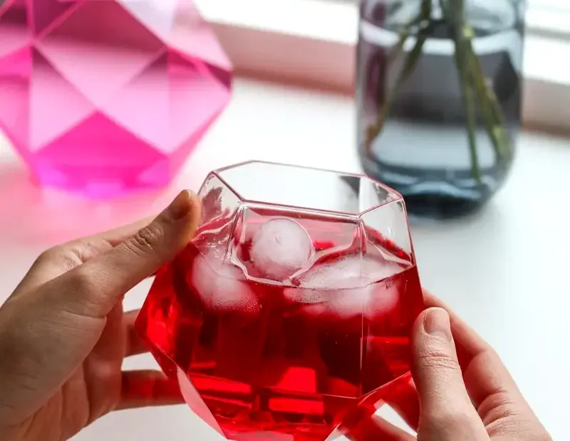 Holiday Cocktail Idea: Red Drink in Geometric Crystal Glass